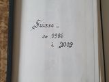 a picture of a book with a pen on top of it