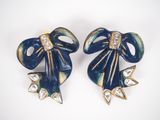 pair of blue and gold bow brooches with crystal stones
