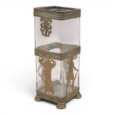 a glass box with a statue inside of it
