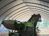 a tractor that is parked inside of a building