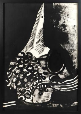a black and white photo of a bird with a hat on it