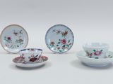 three chinese porcelain dishes and a saucer with floral designs