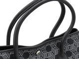 the black and white handbag has a geometric pattern on it