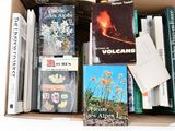 a box full of books that are sitting on a table