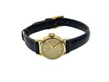 an image of a gold watch with a black leather band
