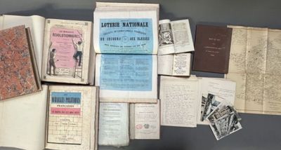 an open book with a bunch of old books on top of it