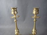 two candles that are sitting on a table