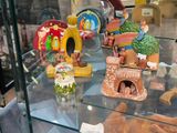 many figurines on display in a glass case