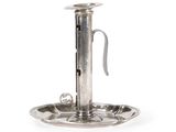 an antique silver plate with a handle and a handle on it