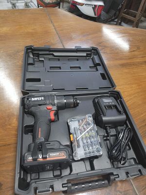 a tool kit in a case on a wooden table