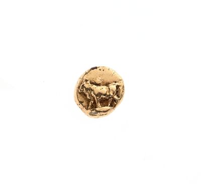 une image représentant une pièce d'or sur laquelle figure un cheval