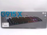a box with a keyboard inside of it on a white surface