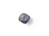 a close up of a purple sapphire stone on a white surface