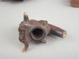 a small pipe that is sitting on a table
