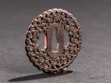 a small metal object that is sitting on a table