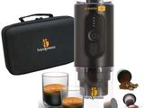 an image of an espresso coffee maker with two glasses of espresso