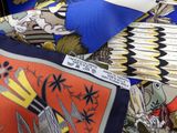 a close up of a tie with a picture of a man on it