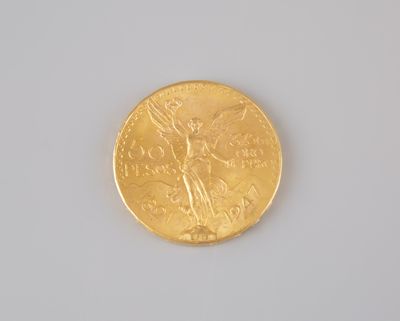 an image of a gold coin on a white surface
