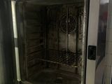 an open oven that is sitting in a kitchen