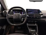 the interior of a car with a steering wheel, dashboard, and dash board