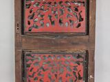 pair of antique carved wood boxes with red paint on them