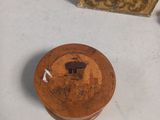 a small wooden box and a small wooden box on a table