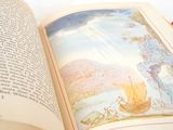an open book with a picture of a man and a woman on it
