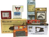many different types of toy trains in the box
