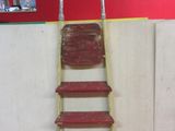 a ladder that is leaning against a wall in a room