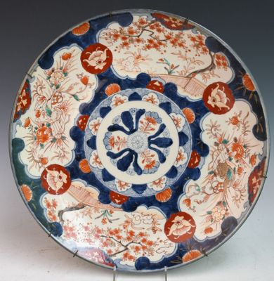 an image of a decorative plate with flowers on it