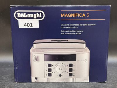 the box of the microwave is open on the table