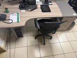 an image of a desk with two computers and a keyboard
