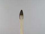 an image of a candle with a candle stick sticking out of it
