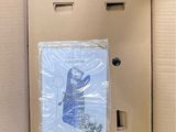 a cardboard box with a picture of a bear inside of it