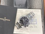 a box with a watch inside of it on a table