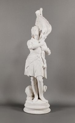 statue of a woman holding a flag on a pedestal