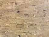 an image of a close up of a painting on a wooden surface