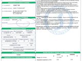 a green and white document with a barcode on it
