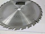 a picture of a circular saw blade on a white surface