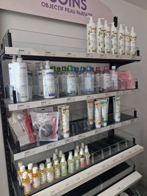 many bottles of nail polish on the shelves in the store