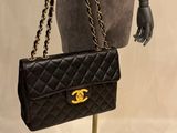 chanel black quilted lambskin flap bag with gold hardware