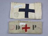 two old cloth bags with red cross and blue cross on them