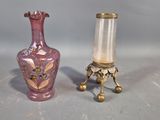 two vases sitting next to each other on a table