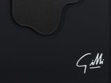 a close up of an apple logo on a black surface