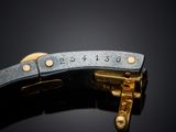 an image of a close up of a metal object with numbers on it