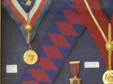 a display case with medals and medals on it