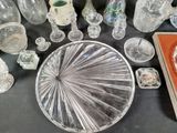 a table with a lot of glass items on it