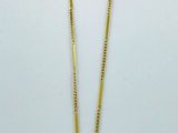 necklace with a black pearl on a gold chain