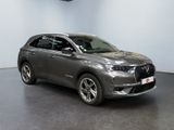 the new dsx suv is parked in a showroom