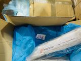 a box full of toilet paper and a basket full of toilet paper
